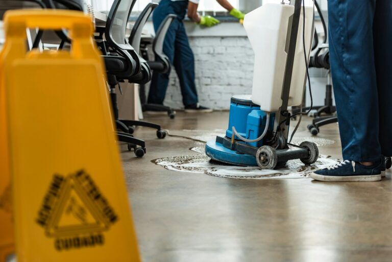 Home 5 Greg Mat's Cleaning Services cleaning the floors of an office building offering Edmonton Cleaning Services.