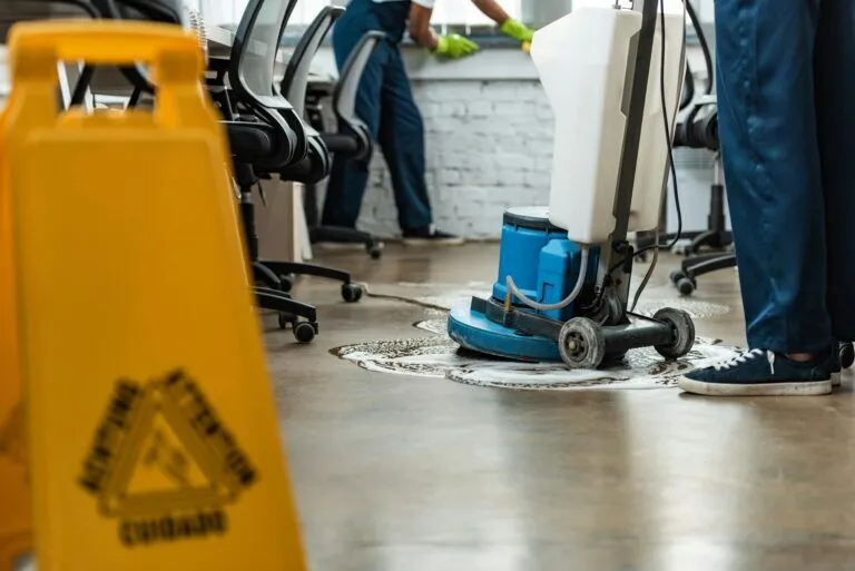 Greg Mat's Cleaning Services cleaning the floors of an office building offering Edmonton Cleaning Services.