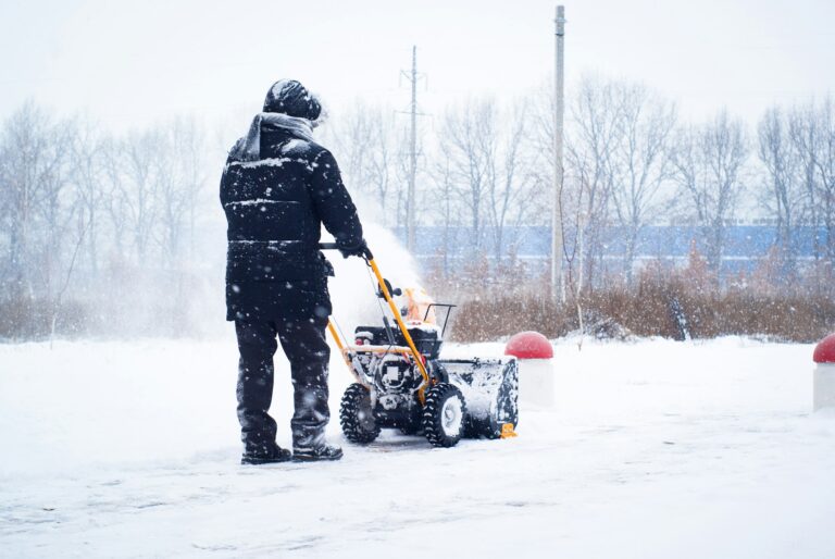 A man cleans snow